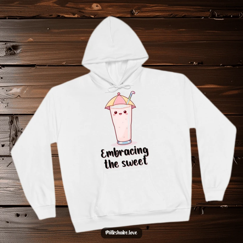 Funny Hoodie featuring a kawaii milkshake glass with a tiny umbrella, enjoying sugary rain, radiating cozy and whimsical vibes.