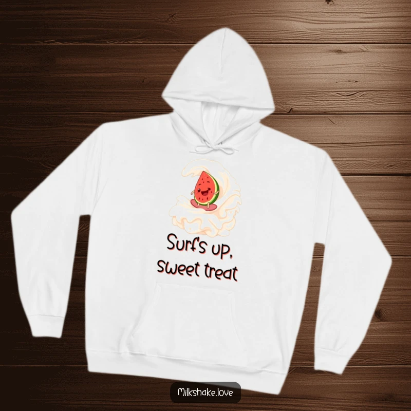 Funny Watermelon Surf Hoodie featuring a cheerful watermelon slice masterfully surfing a large whipped cream wave, perfect for cozy, cool days.