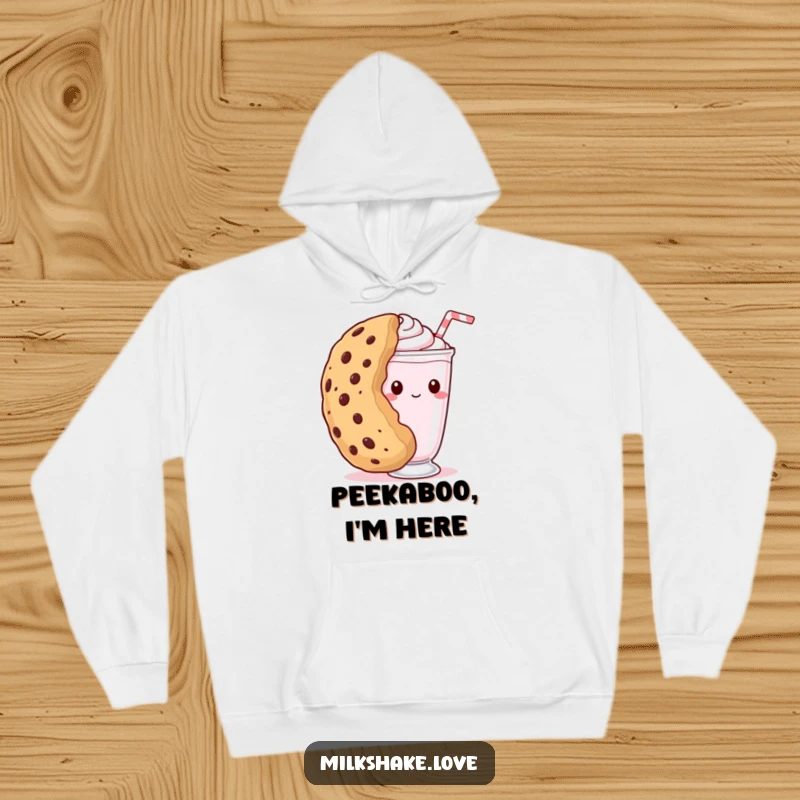 Funny kawaii milkshake hoodie featuring a shy milkshake peeking from behind a giant cookie, ideal for comfortable and charming relaxation.