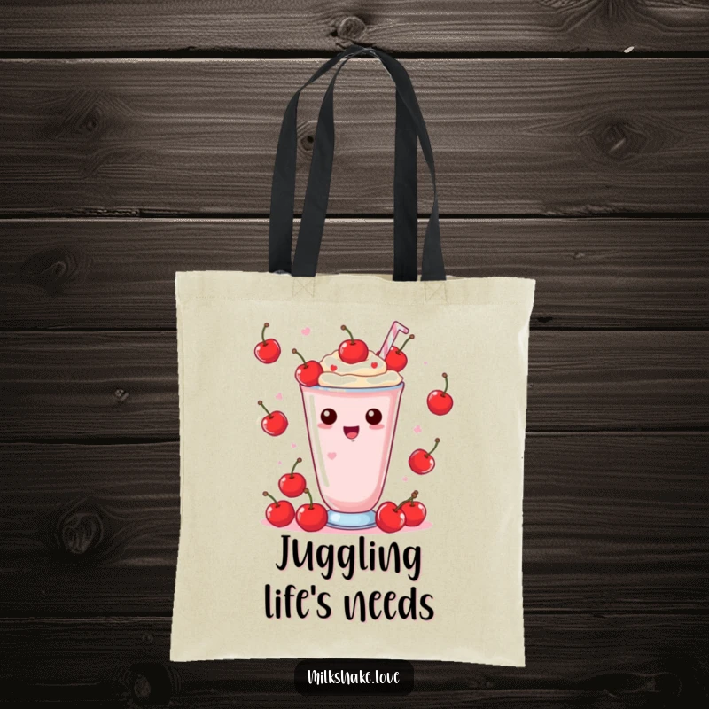 Funny Tote Bag featuring a Kawaii milkshake enthusiastically juggling little red cherries with a look of pure delight.